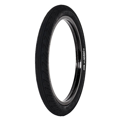 20x2.3 Strada Nuova Bicycle Tire featuring a smooth centerline, siped shoulders, and a thicker tread area, designed for durability and flat resistance, displayed with a black rim.