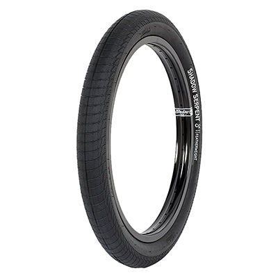 20x2.3 Black/Black Serpent Bicycle Tire featuring a micro knurled smooth tread with horizontal lines, designed for close course park and ramp riding, noted for its speed and lightness.