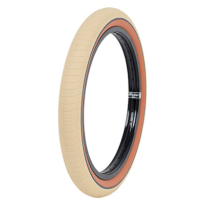 20x2.3 Cream Serpent Bicycle Tire, featuring a micro knurled smooth tread with horizontal lined section, ideal for close course park and ramp riding.