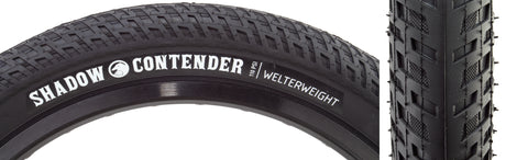 Close-up of the 20x2.35 Black/Black Contender Welterweight Bicycle Tire showcasing its multi-step inverted tread and thick walled 60tpi casing.