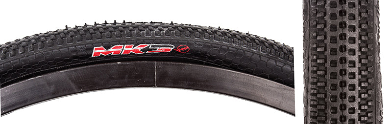 Close-up of a 20x1-1/8 MK3 Bicycle Tire showing small knobs for traction and relatively smooth surface for speed.