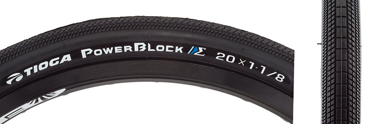 Close-up of a 20x1-1/8 PowerBlock S-Spec Bicycle Tire, showcasing the low profile directional side lugs and smooth center tread designed for excellent cornering and reduced rolling resistance on hard pack surfaces.