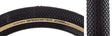 Close-up of the 20x1-1/8 Black/Tan Speedster Bicycle Tire showcasing its tread pattern, designed for high performance and minimal drag on hard pack or paved terrain.