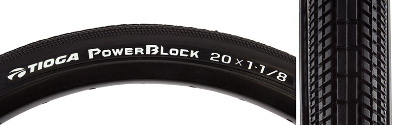 Close-up of a 20x1-1/8 PowerBlock Bicycle Tire showcasing its tread pattern and white text, designed for low rolling resistance and durability with Ultimate Traction Compound.