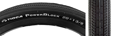 Close-up of the 20x1-3/8 PowerBlock Bicycle Tire, highlighting its tread pattern and white branding, designed for low rolling resistance and durable performance.