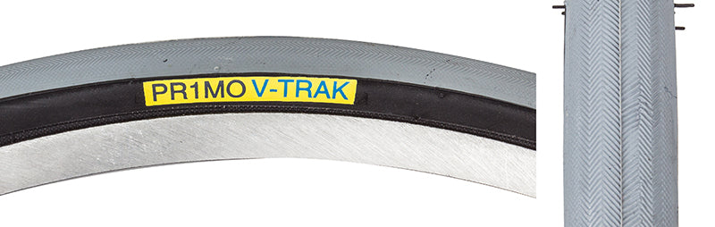 Close-up of the 24x1 V-Track Bicycle Tire, highlighting the textured tread and durable sidewall, designed for optimal performance and stability.