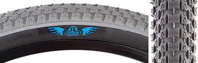 Close-up of the 24x2.0 Gray Cub Bicycle Tire showcasing its classic BMX street tread pattern, designed by Vee Tire in collaboration with SE Bikes for durability and versatility across all terrain types.