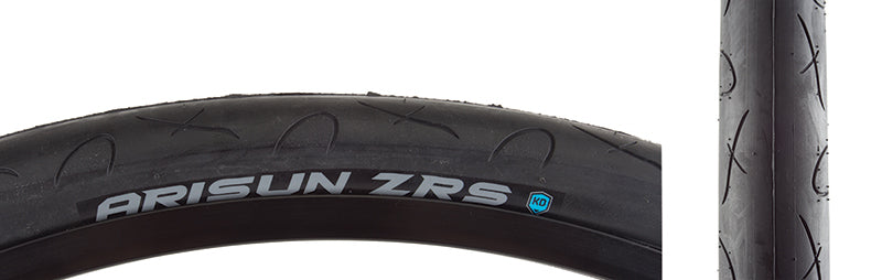 Close-up of a 26x1.5 ZRS Wire/60 Bicycle Tire showcasing its smooth center and grooved shoulders designed for enhanced corner traction.