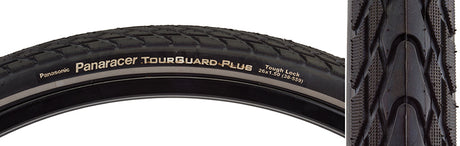 Close-up of the 26x1.5 Reflective Tourguard Plus Bicycle Tire showcasing its deep tread pattern and puncture-resistant rubber belt, designed for urban roads with added reflective tape for visibility.