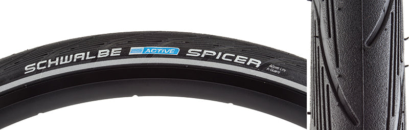 Close-up of the 26x1.5 Reflective Spicer Active Lite K-Guard Bicycle Tire, showcasing its smooth center tread and reflective sidewall stripes, highlighting durability and puncture protection.