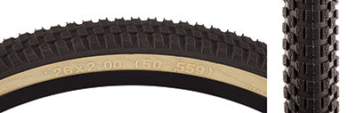 Close-up of a 26x2.0 Black/Tan Cub Bicycle Tire, showcasing its detailed street tread pattern and vintage BMX styling from the Vee Tire and SE Bikes collaboration.