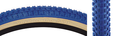 Close-up of a 26x2.0 Blue/Tan Cub Bicycle Tire, showcasing its classic BMX street tread pattern, a result of a collaboration between Vee Tire and SE Bikes.