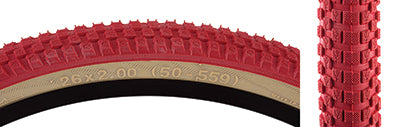 Close-up of the 26x2.0 Red/Tan Cub Bicycle Tire, featuring BMX-style street tread designed by Vee Tire and SE Bikes, showcasing the intricate tread pattern and robust construction.