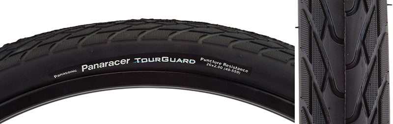 Close-up of a 26x2.0 Tourguard Bicycle Tire, highlighting its tread pattern and Aramid belting for puncture protection, ideal for urban or touring use with excellent wet weather performance.