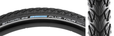 Close-up of a 26x2.0 Reflective Marathon Plus Tour Performance Twin SmartGuard Bicycle Tire showcasing thick tread, deep water grooves, and a reflective sidewall strip, designed for durability and E-Bike compatibility.