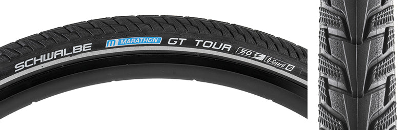 Close-up of the 26x2.0 Reflective Marathon GT Tour Performance Twin DualGuard Bicycle Tire showcasing its smooth center chevrons, textured shoulders, and DualGuard puncture protection with reflective sidewall striping for enhanced visibility.