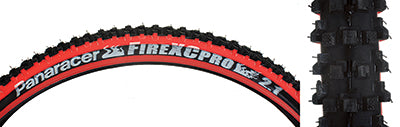 Close-up of a 26x2.1 Black/Red Fire XC Pro Wire Bicycle Tire featuring aggressive lateral tread and multi-stepped knobs for all-condition performance.