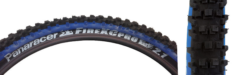 Close-up of the 26x2.1 Fire XC Pro Bicycle Tire, showcasing its aggressive lateral tread and multi-stepped knobs designed for all conditions XC riding.