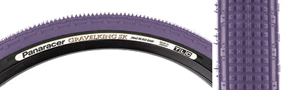 Close-up of the 26x2.1 Purple/Black Gravel King SK Bicycle Tire, showcasing its square knobs and continuous ridges designed for smooth rolling and superior grip on rough or gravel roads.