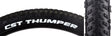 Close-up of the 26x2.1 Thumper Bicycle Tire showcasing its innovative tread pattern for enhanced traction and cornering, designed for versatile performance on rough mountain bike trails.