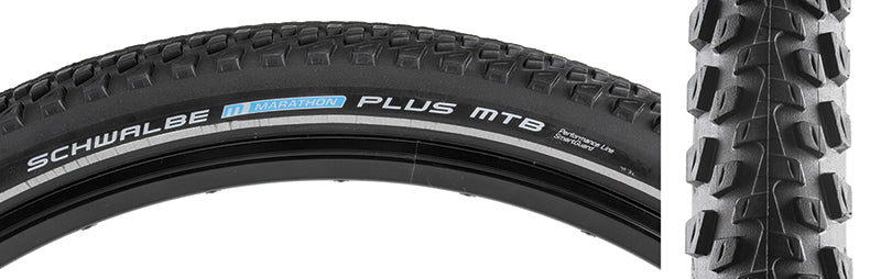 Close-up of the 26x2.1 Reflective Marathon Plus MTB Performance Twin SmartGuard Bicycle Tire, highlighting the connected offset center ribs, strong outer lugs, and reflective sidewall striping.