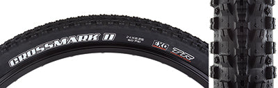 Close-up of the 26x2.25 CrossMark II EXO/TR Bicycle Tire, showcasing its updated tread pattern for improved braking and cornering, and EXO sidewall protection against punctures.