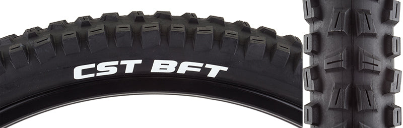 Close-up of a 26x2.4 BFT Bicycle Tire showcasing its aggressive tread design, ideal for loose and wet conditions. The tire's single compound construction emphasizes durability and performance.