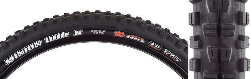 Close-up of the 26x2.4 Minion DHR II TERRA/EXO/TR Bicycle Tire, showcasing its rugged tread pattern designed for aggressive trail riding and enhanced sidewall protection.