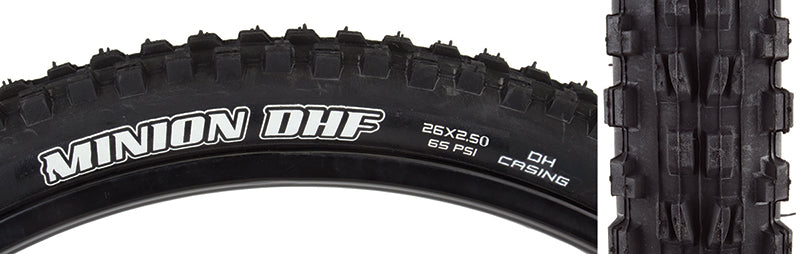 Close-up of a 26x2.5 Minion DHF Bicycle Tire, showcasing its ramped knobs and channel-cut knobs designed for low rolling resistance and improved gripping edges, ideal for downhill riding.