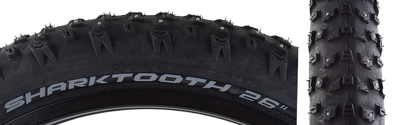 26x4.0 Sharktooth Wire/60/152-Stud Bicycle Tire close-up, showcasing the V-shaped, longitudinal tread lugs and spikes designed for traction on ice, snow, and soft terrain.