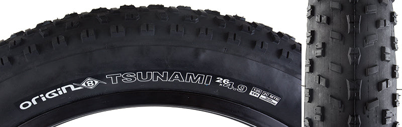 Close-up of the 26x4.9 Tsunami Bicycle Tire showcasing well-spaced, siped lugs for minimal rolling resistance and enhanced grip in various conditions, highlighted by staggered corner lugs for stable turning.