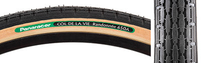 Close-up of the 26x1-3/8 Randonnee Bicycle Tire from the Col De La Vie series, highlighting the detailed tread pattern and robust synthetic rubber construction.