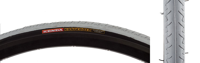 Close-up of the 26x1 (590) Kontender Bicycle Tire, showcasing its slick center and grooved lateral tread designed for training and racing traction.