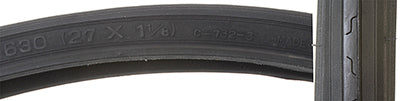 Close-up of a 27x1-1/8 CST732 Bicycle Tire featuring grooved tread and directional siping.