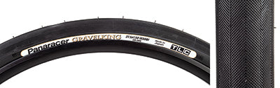 Close-up of the 27.5x1.5 Black/Black Gravel King Slick Bicycle Tire showcasing its minimal file style tread and robust volume, ideal for both road and gravel conditions.