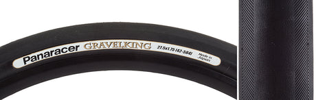 Close-up of the 27.5x1.75 Black/Black Gravel King Slick Bicycle Tire, showcasing its minimal file tread and robust volume, designed for superior grip on both road and gravel surfaces.