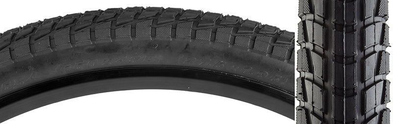 Close-up of the 27.5x1.95 Komfort Bicycle Tire showcasing its tight directional center tread pattern with lateral knobs for enhanced traction.