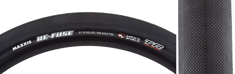 Close-up of the 27.5x2.0 Re-Fuse SC/MS/TR Bicycle Tire showcasing its diamond knurled slick design and white text, emphasizing its durable single compound casing and advanced MaxxShield flat protection.