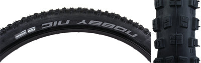 27.5x2.25 Nobby Nic Performance Lite Bicycle Tire, featuring V-grooves and large outer blocks for enhanced braking and cornering, ideal for racing and trail riding, with excellent grip and speed capabilities.