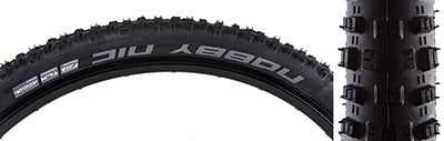 27.5x2.25 Nobby Nic Performance Twin Bicycle Tire showcasing alternating center lugs, staggered shoulder lugs, and white text branding, designed for offroad use with enhanced grip and tubeless-ready capabilities.