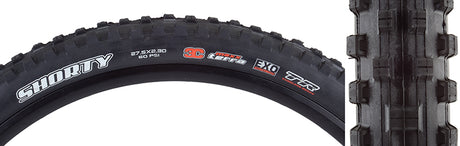 27.5x2.3 Shorty TERRA/EXO/TR Bicycle Tire close-up showcasing large, aggressive knobs and white logo, designed for ultimate traction and stable cornering in loose soil, with EXO sidewall protection for puncture resistance.