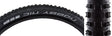 27.5x2.35 Nobby Nic Performance Twin Bicycle Tire with white text, featuring alternating center lugs and staggered shoulder lugs for improved offroad grip, and a sidewall with additional rubber coating for protection.