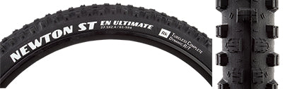 27.5x2.4 Newton ST Ultimate Bicycle Tire close-up showing tread design with ramped center knobs and tall, arch-supported side knobs for enhanced cornering and braking grip.