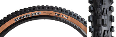 Close-up of the 27.5x2.5 Minion DHF EXO/TR/WT Bicycle Tire, showcasing its ramped knobs for low rolling resistance and channel-cut knobs for enhanced grip and control.