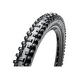 27.5x2.5 Shorty Bicycle Tire featuring large, aggressive knobs and spiked tread for ultimate traction, visible with close-up detailing of the side knobs designed for stable cornering and puncture-resistant sidewalls.