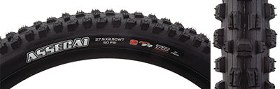 Close-up of the 27.5x2.5 Assegai 3CG/TR/DH/WT Bicycle Tire, highlighting its detailed tread pattern, including ramped and siped center knobs and large corner knobs designed for enhanced traction and durability.