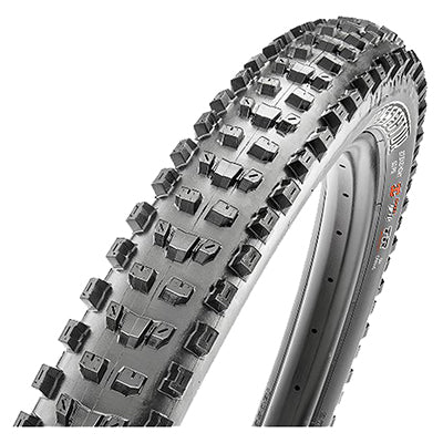 Close-up of the 27.5x2.6 Dissector EXO/TR Bicycle Tire, showcasing its round profile, large siped knobs, and robust sidewall protection designed for optimal traction and minimized rolling resistance.