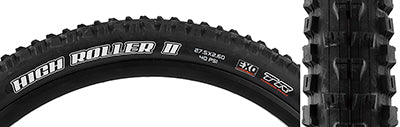 Close-up of the 27.5x2.6 High Roller II DC/EXO/TR Bicycle Tire showing aggressive tread design for mud clearing, tubeless-ready construction, and EXO sidewall protection for puncture resistance.