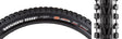 27.5x2.8 Minion DHF TERRA/EXO/TR Bicycle Tire featuring a distinctive tread pattern with ramped and channel-cut knobs for enhanced control and traction, shown in a close-up view highlighting the tread and sidewall text.