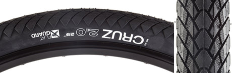 Close-up of a 29x2.0 Cruz Flat Guard Bicycle Tire showcasing its shallow, tightly spaced tread blocks and robust Urban Armor Casing for enhanced puncture resistance and durability.